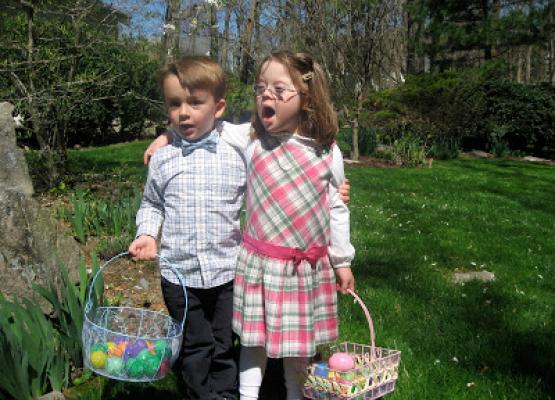 boy and girl holding Easter baskets