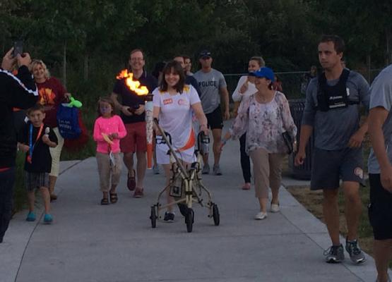 Our very own Nydia Langill lights Parapan Am torch