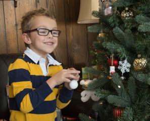 Alex decorating the Christmas tree