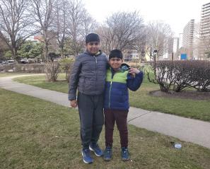 Mahad and Zain outside. 