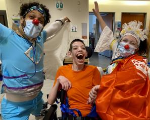 Matthew laughing with the therapeutic clowns. 
