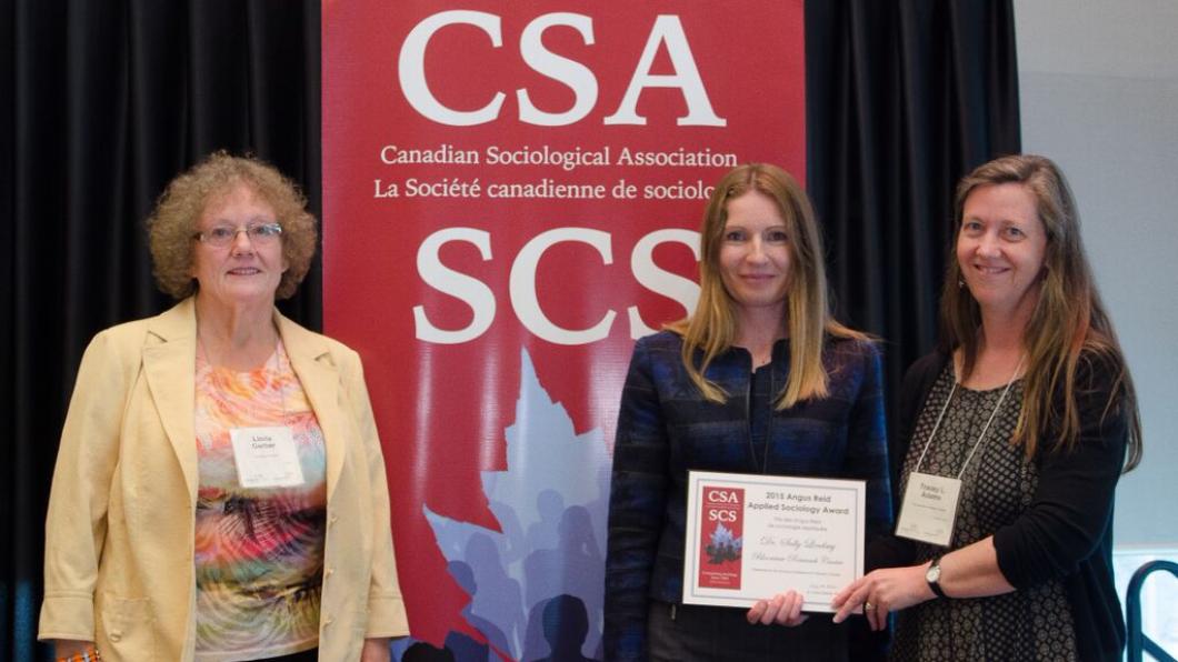 Sally Lindsay (centre) receives her award from Linda Gerber (left, CSA President) and Tracey Adam (right, one of her nominators)