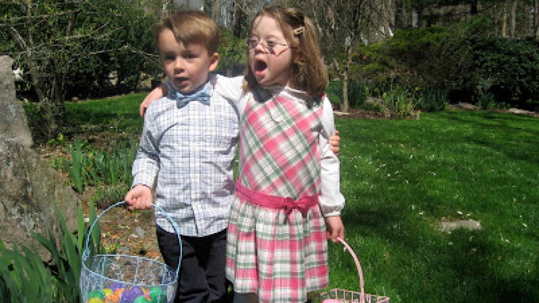 boy and girl holding Easter baskets