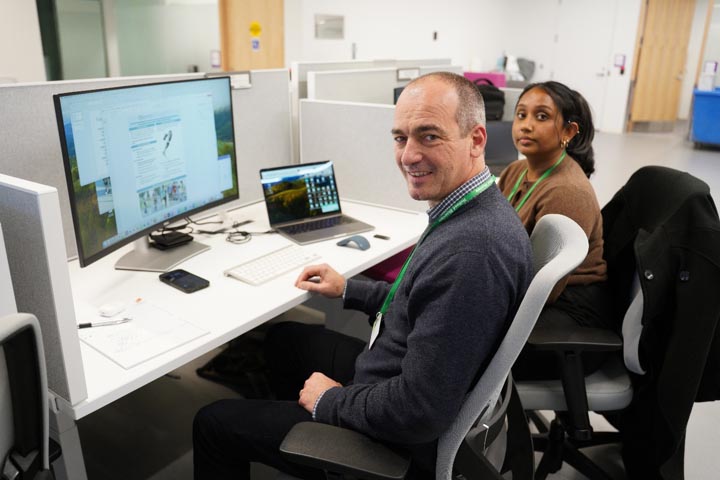 Bionic Power CEO Gualtiero Guadagni and a colleague work from Holland Bloorview's innovation incubator space in 2023.