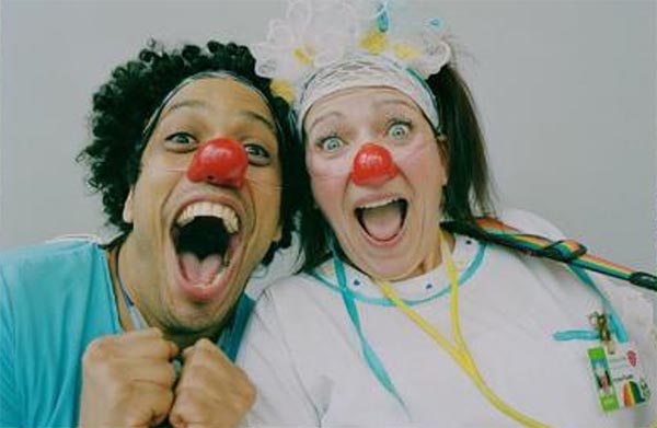 Two clowns laughing