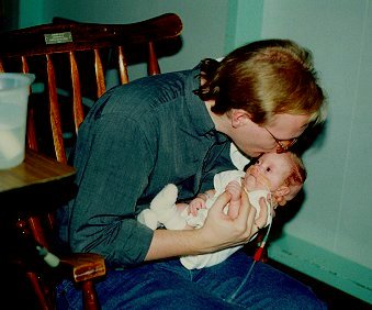 Matt holding Leah when she was a baby