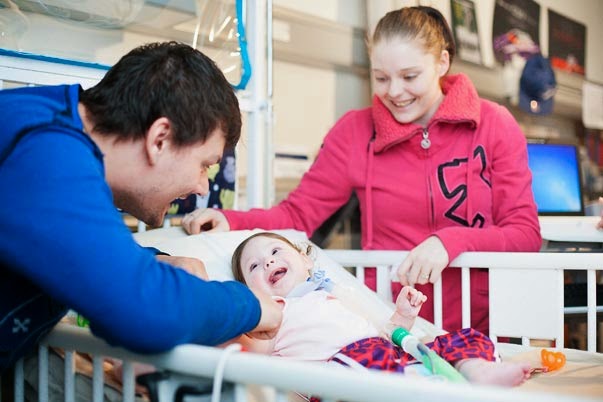 Zoey Faith enjoying a fun moment with her parents, Amanda Mintenko and Mathew Lamarche