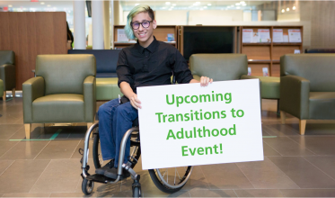 young man using a wheelchair holding up a sign promoting transition events