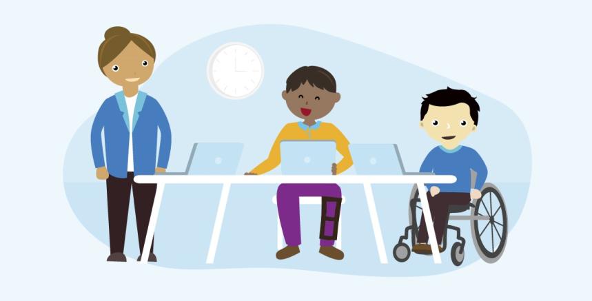 3 people are positioned behind a desk. One person is standing and 2 people are seated, everyone has a open laptop in front of them