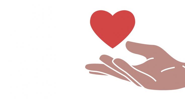 Heart above an open palm
