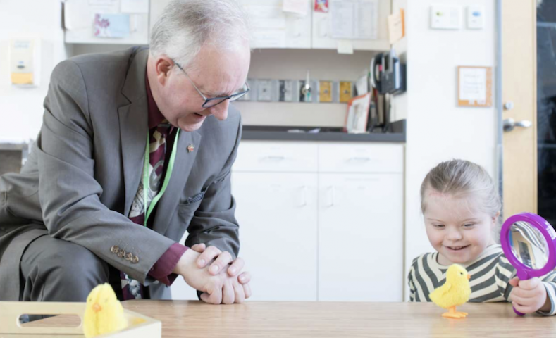 Doctor with little girl