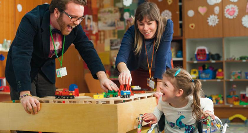 Staff interacting with a child