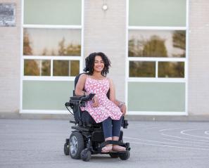 Jadine in her electronic wheelchair 