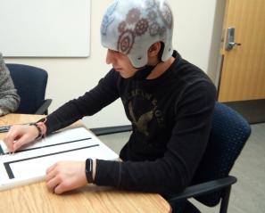 Jacob wearing his helmet on his rehabilitation journey.