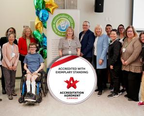A group of people with the Accreditation Canada badge