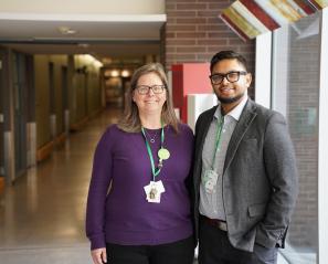 Clinicians standing in hallway