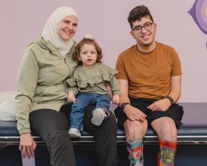 An adult with 2 children