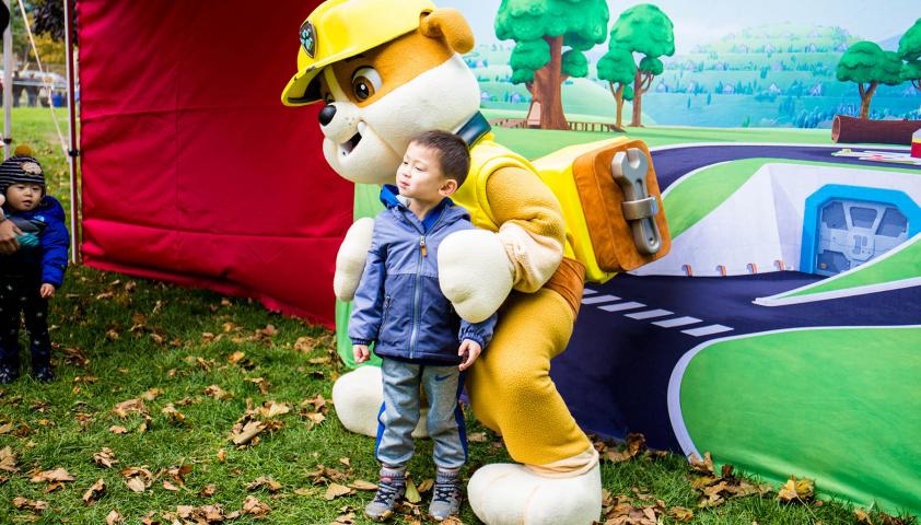 child with mascot