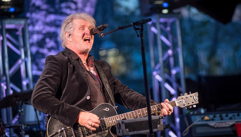 tom cochrane playing closeup