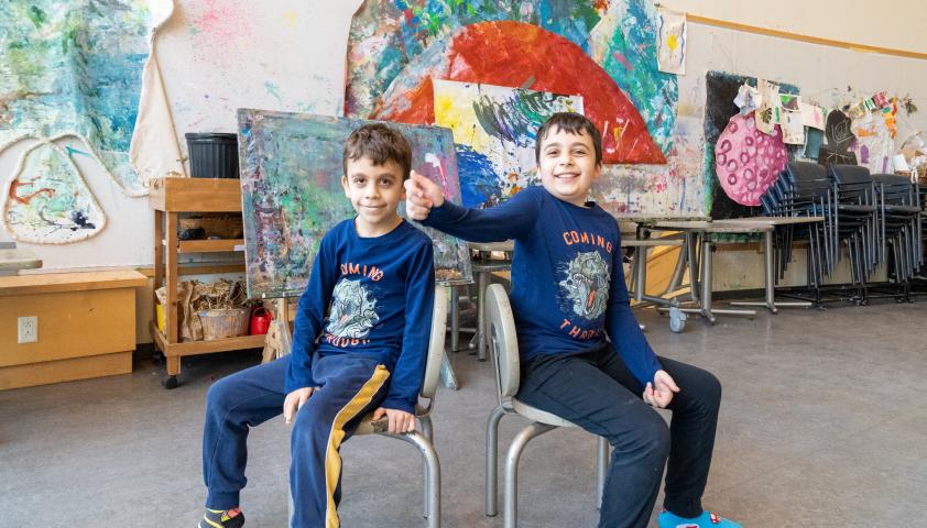 Norrin and his brother Alex sitting in the art studio.