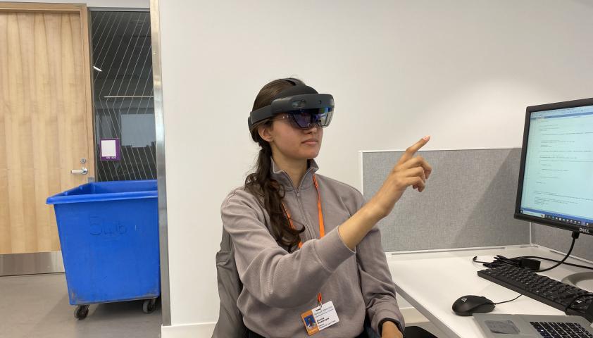 Anusha wearing the the Hololens2 headset.