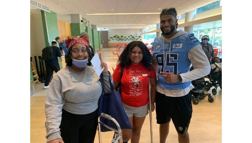 Savannah and Toni with Argos player. 