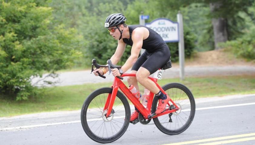 Xavier biking in the ironman