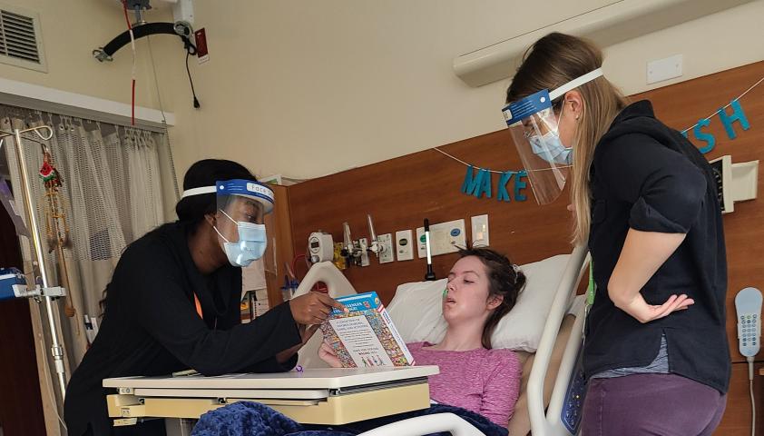 Katie reading in bed