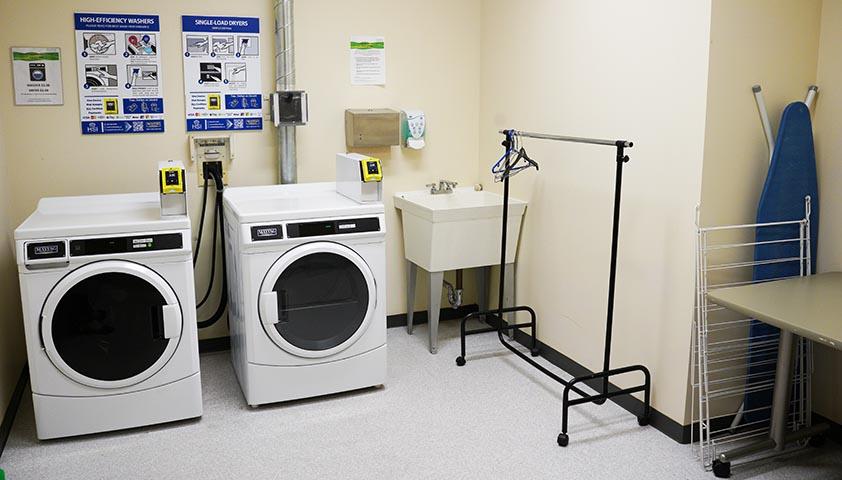 Laundry room with washer and dryer