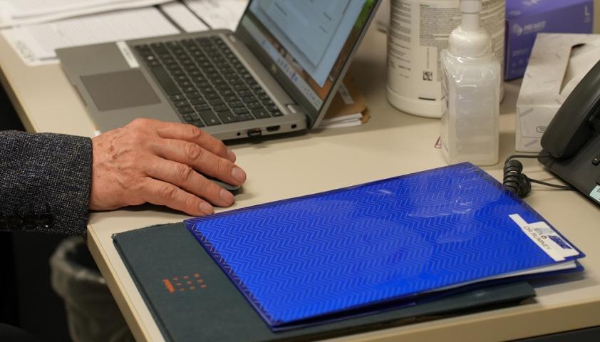 Dr. Rumney moving his computer mouse