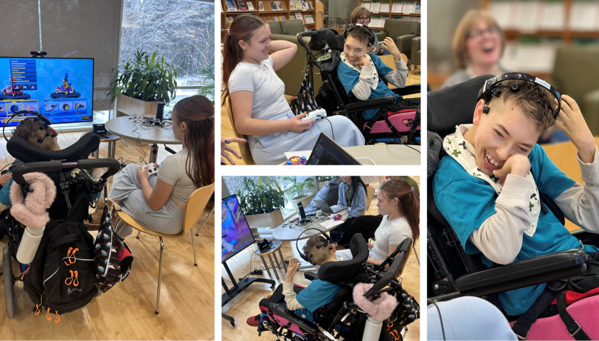 Two teens playing a video game. One teen is in a wheelchair wearing a BCI headset to play, and one teen is sitting in a chair using a handheld controller.