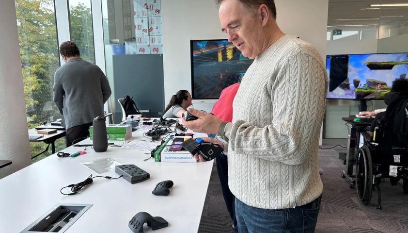 Ari Rivera a technology consultant checks out a gaming device