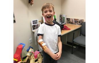 Nolen wearing his prosthetic for the first time. 