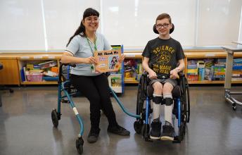Two teenagers on wheelchairs