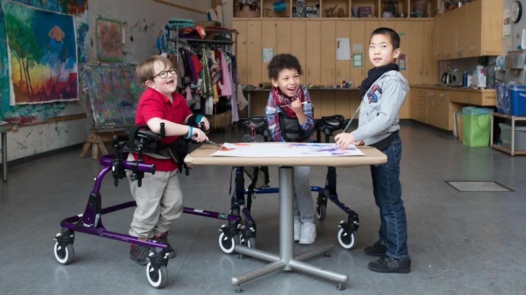 Kids in the art studio making work.