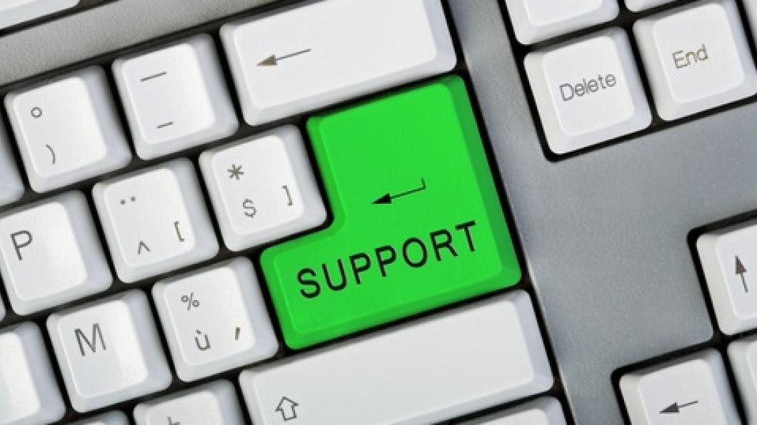Keyboard with the green enter button called SUPPORT