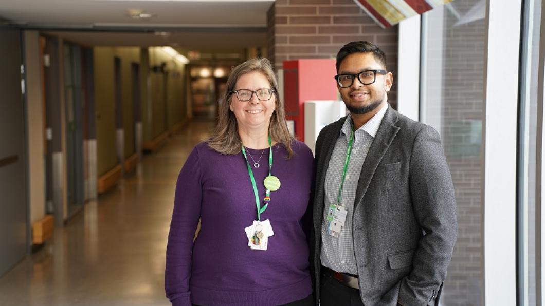 Clinicians standing in hallway