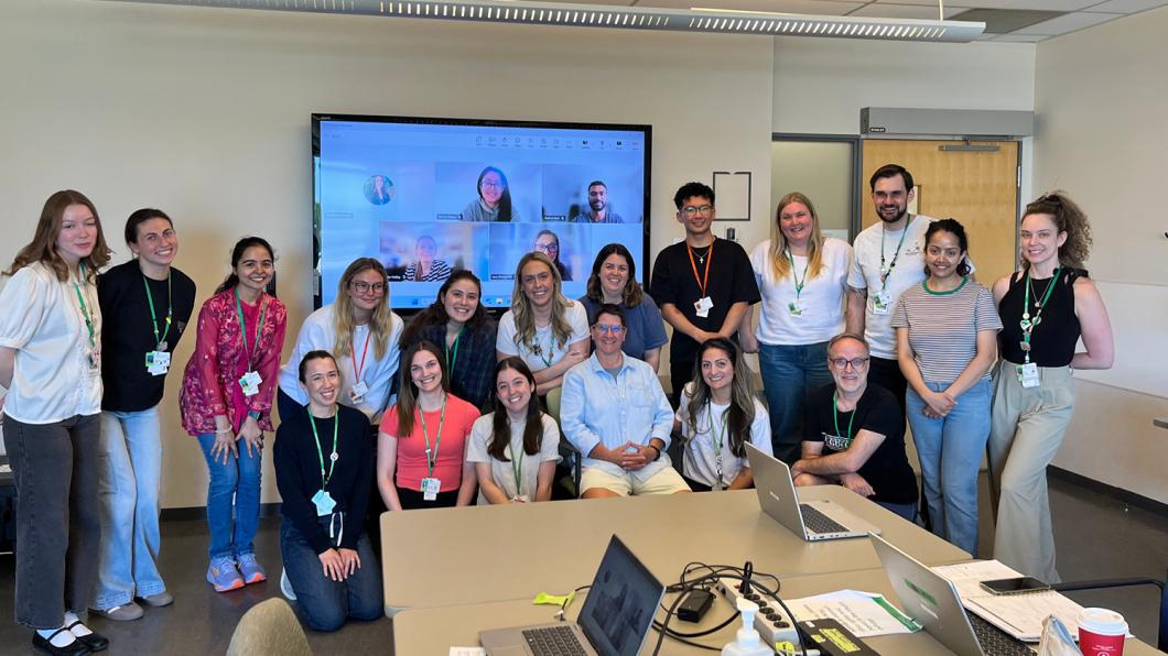 group of clinicians in a room smiling