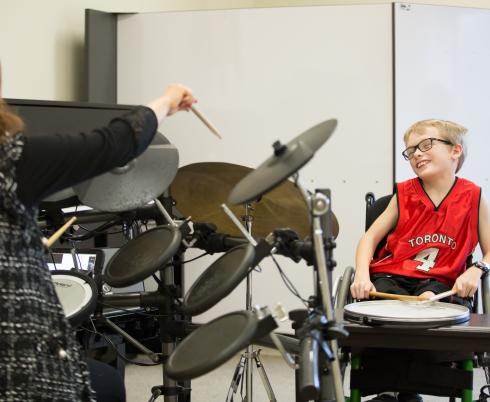 Boy playing drums 