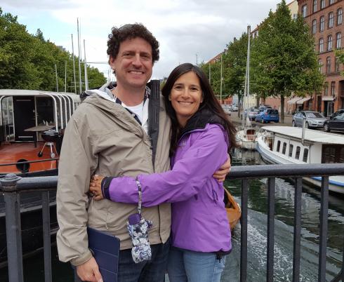 Wes and Lisa hugging on a bridge in Amsterdam