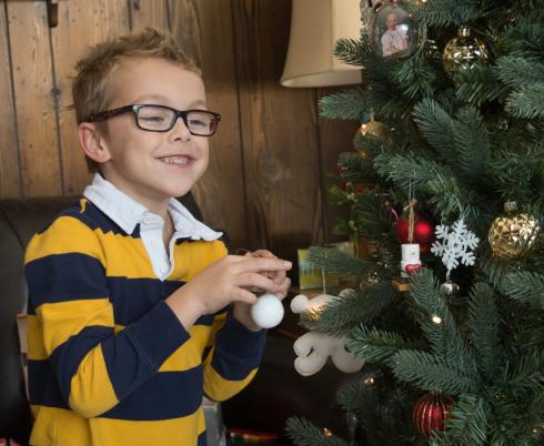 Alex decorating the Christmas tree