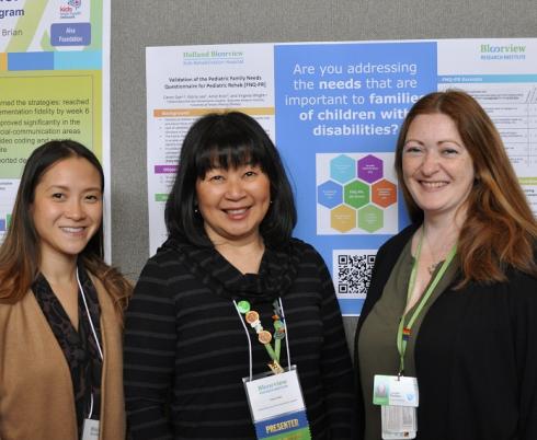 Gloria Lee, a research manager (left), Caron Gan, advanced practice nurse/family therapist and clinical team investigator [middle], and Louise Rudden, a nurse practitioner (right), present their research at the symposium’s poster presentation session