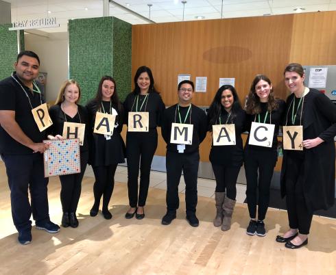 The pharmacy team in a Scrabble costume. 