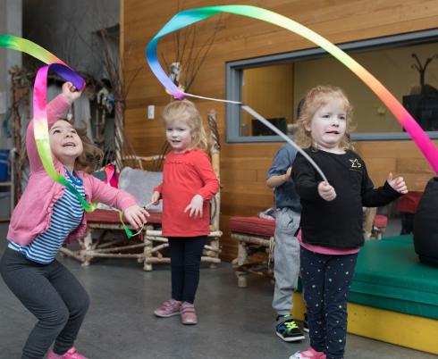 Kids playing with ribbons
