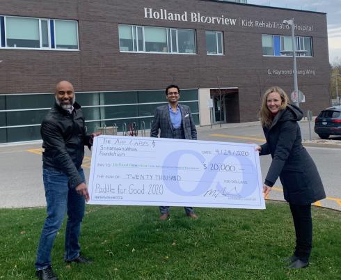 Muraly and Kundan at the donation cheque presentation. 