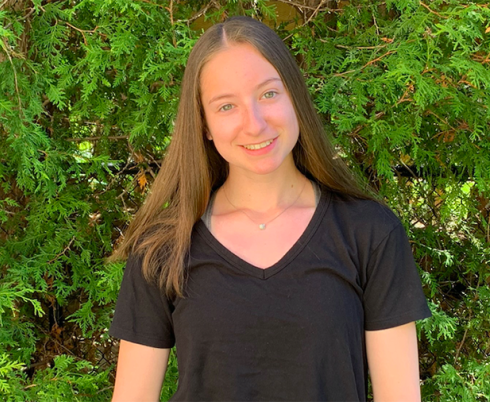 Stacey smiling at the camera.