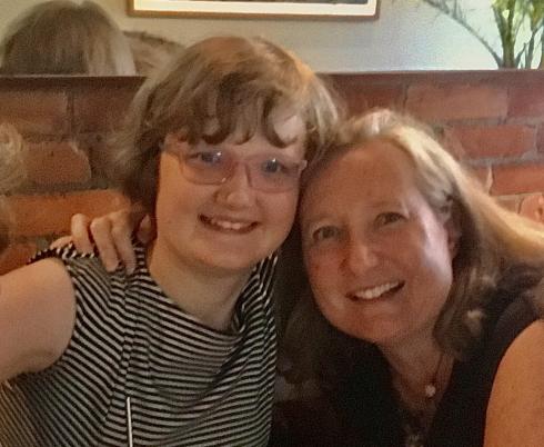 Jean with Ellie smiling at the camera.