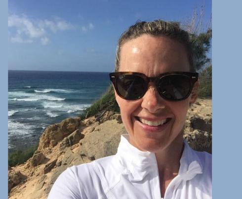 Paige Church in front of the water