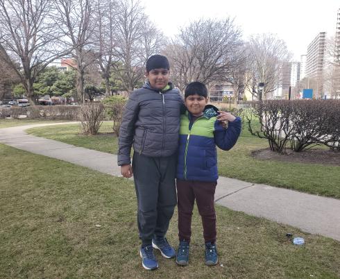 Mahad and Zain outside. 