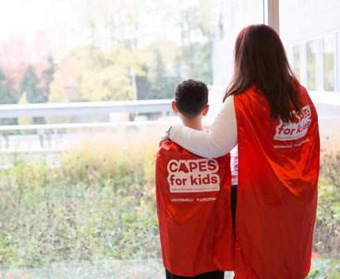 Zion and Marlaina in capes